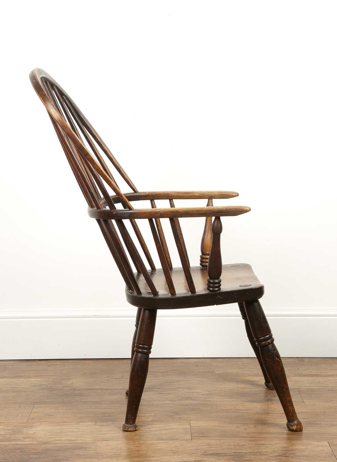 Windsor chair ash and elm, 19th Century, with hoop spindle back, 98cm high overallHeavy wear, - Image 5 of 7