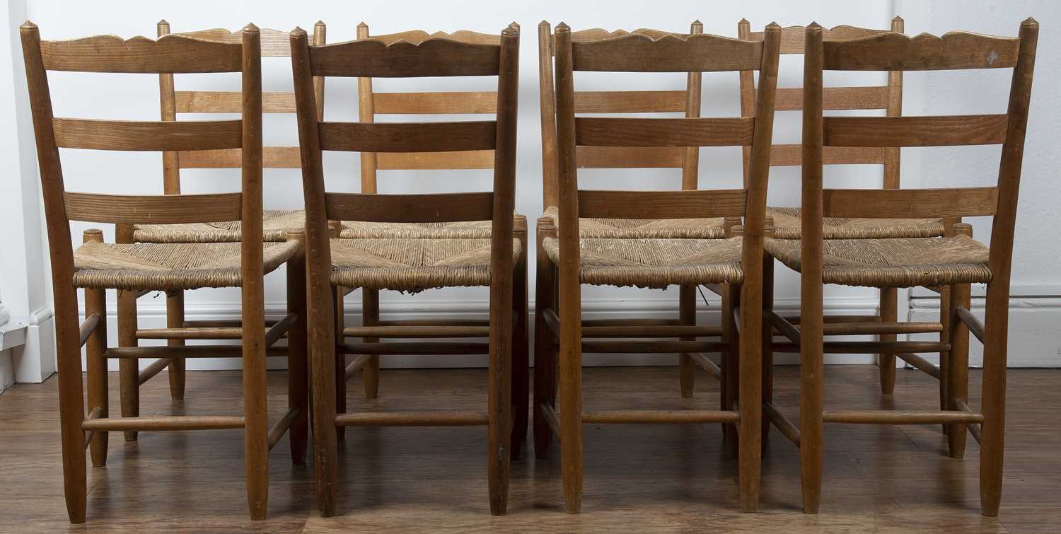 Gordon Russell (1892-1980) Set of eight ash ladderback chairs with rush seats, and turned - Image 2 of 3