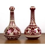 Burmantofts pottery Matched pair of vases with red repeating foliate designs, impressed marks to the