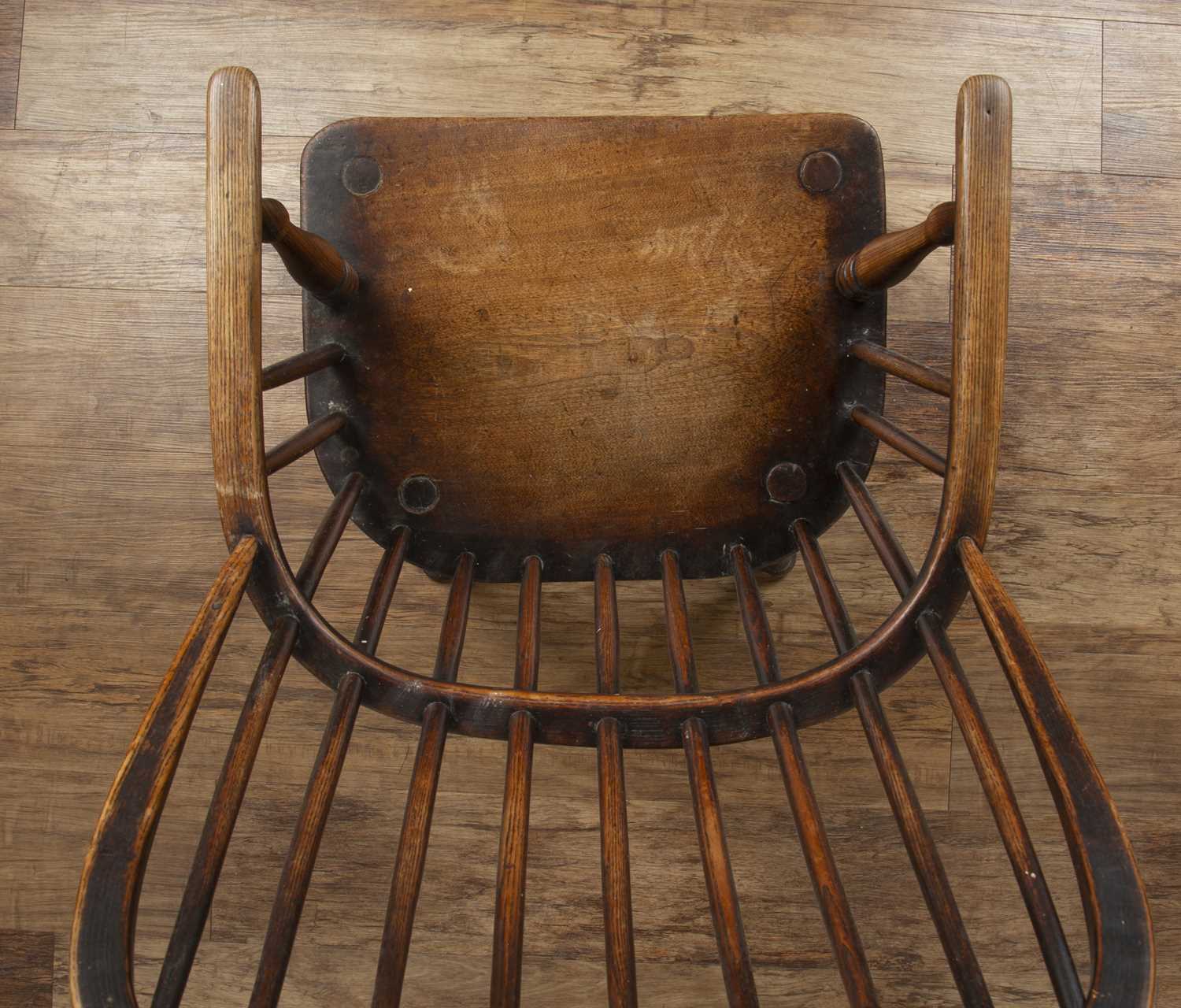 Windsor chair ash and elm, 19th Century, with hoop spindle back, 98cm high overallHeavy wear, - Image 7 of 7