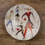 Elio Schiavon (1925-2004) pottery charger decorated with figures in a tin glaze signed to the