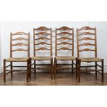 Gordon Russell (1892-1980) Four yew wood chairs with carved ladder and rush seats, two measures