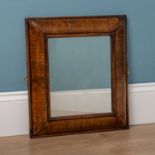 An antique cushion moulded wall mirror