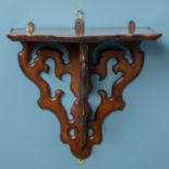 A Victorian rosewood clock or wall bracket