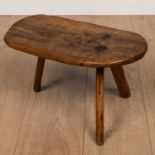 A 19th century elm rustic low stool