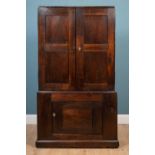 A George III oak Country House cupboard