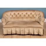 A Victorian small button back upholstered sofa