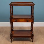 A Victorian mahogany three-tier whatnot