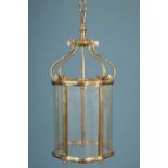 A brass four-glass hall lantern