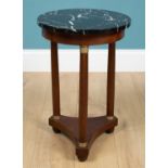 An Empire style circular marble-topped occasional table
