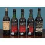 Five bottles of vintage port