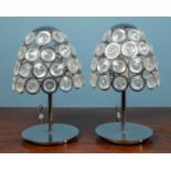 A pair of contemporary silvered table lamps