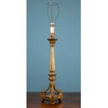 An antique carved giltwood Italian table lamp