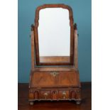 An antique, possibly early 18th century, dressing table mirror