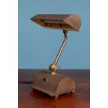 A mid 20th century lacquered brass articulated desk lamp