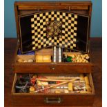 A 1930's oak cased games compendium