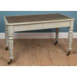 A Victorian grey painted writing table with a leather inset top