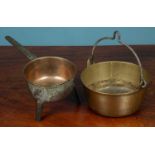 A brass preserve pan and an early 19th century skillet