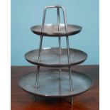 A silver plated Christofle three-tier cake stand of simple form