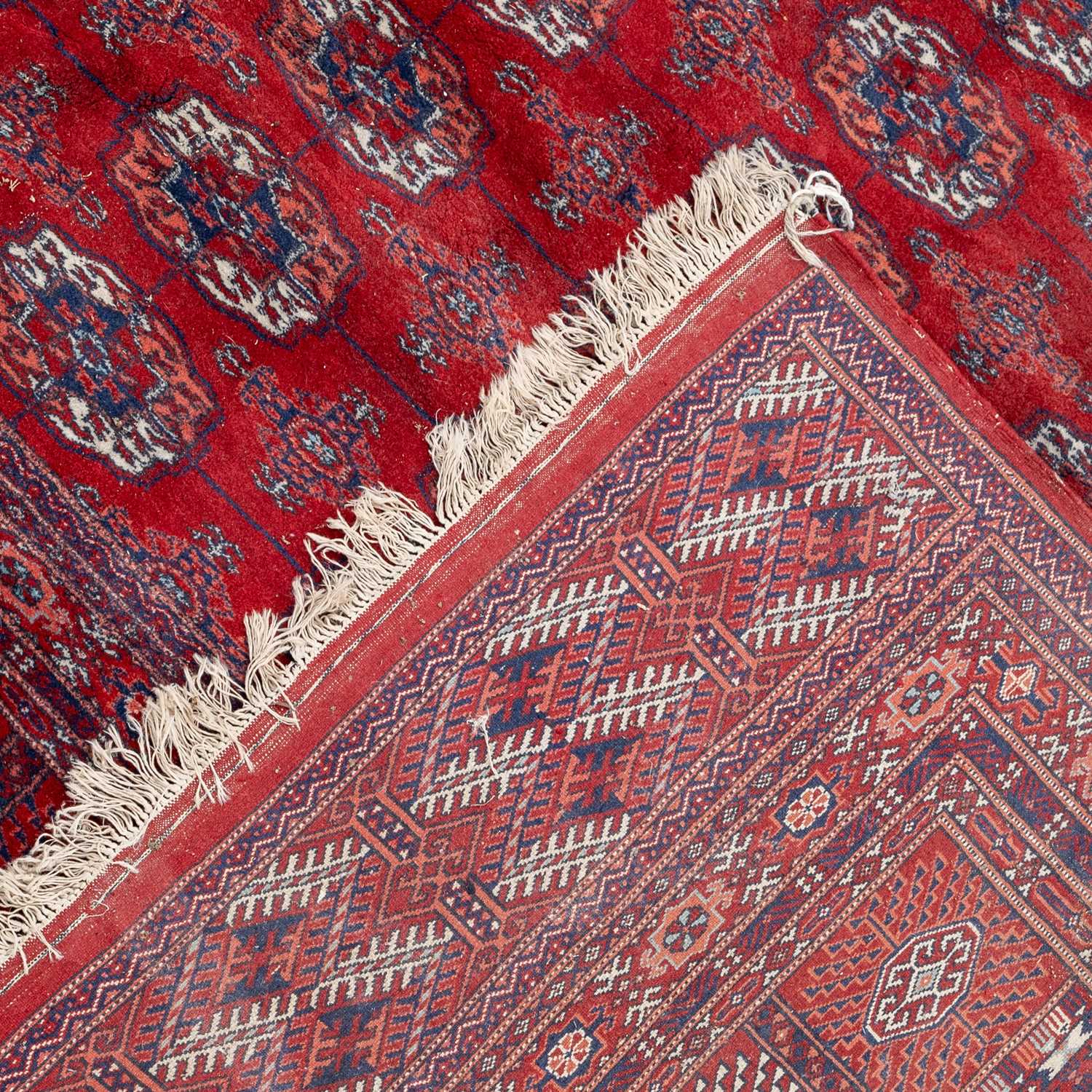 A Baluchi style red ground carpet - Image 3 of 3