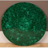 A malachite veneered circular tabletop