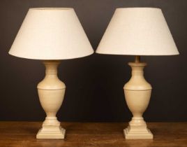A pair of table lamps in the form of urns