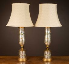 A pair of découpage table lamps retailed on Park avenue, New York