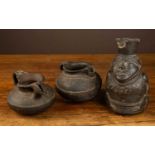 Three possibly South American pottery vessels, one figural