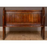 An early 20th century pine pew