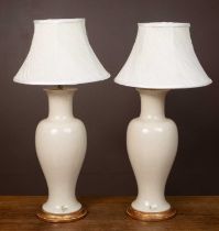 A pair of crackle glazed lamps