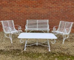 A set of white painted wrought iron French style garden furniture