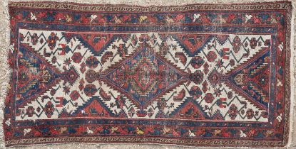 An early 20th century Sarab runner together with a modern Bokhara style rug