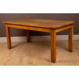 A modern pale oak kitchen table, together with six pine chairs