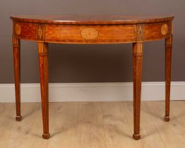 A George III Sheraton satinwood demi-lune side table