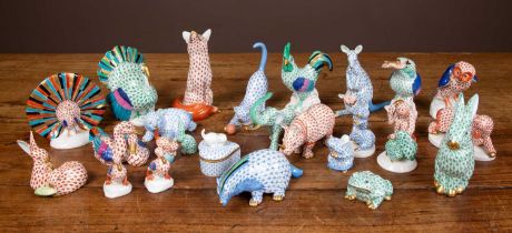 A collection of twenty five Herend porcelain animals and a heart shaped box