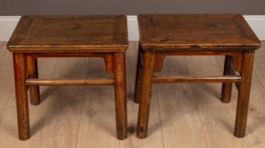 A pair of Chinese hardwood occasional tables