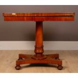 A William IV mahogany fold-over card table