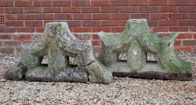 Two stone carved parapet mounts