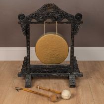 An antique hardwood framed dinner gong