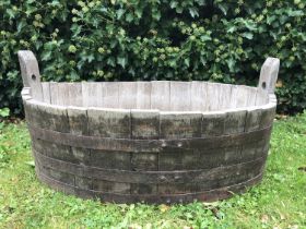 A coopered oak oval tub