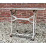 A marble-topped garden table