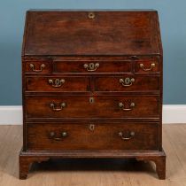 A George III provincial fruitwood bureau