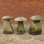 A group of three old staddle stone