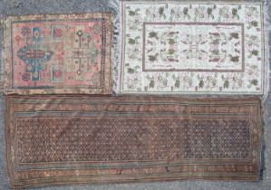 A collection of three carpets
