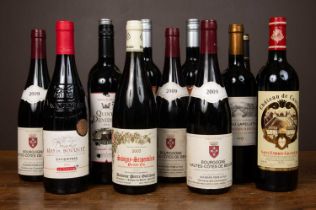 A collection of twelve bottles of red wine