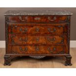 An 18th century style Irish mahogany chest of drawers with a marble top in the Chippendale style