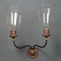 An antique Continental bronze two-branch wall lamp