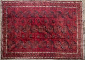 A large red ground Belouchi carpet