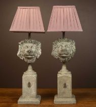 A pair of lion mask table lamps