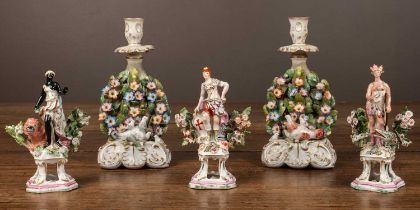 A pair of Samson Bocage candlesticks and figures depicting three continents